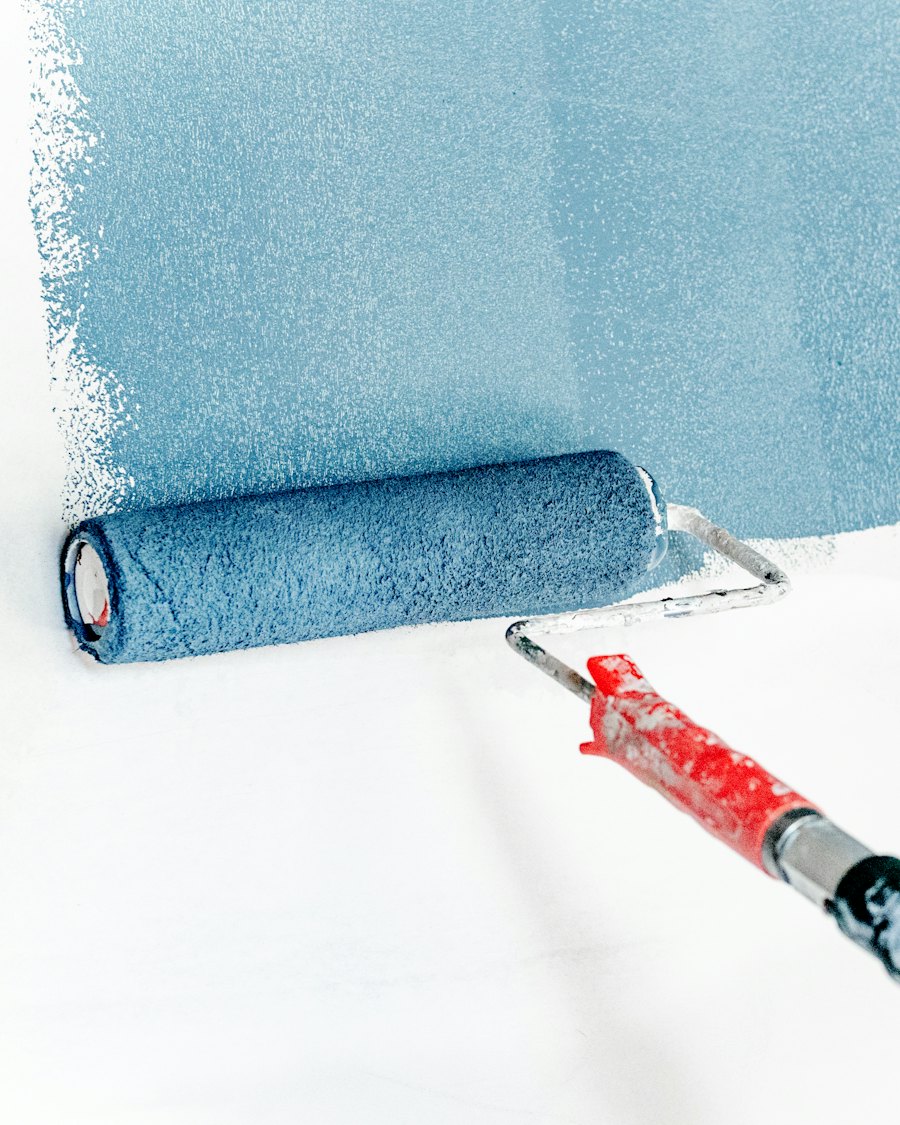 Applying waterproofing paint with a roller